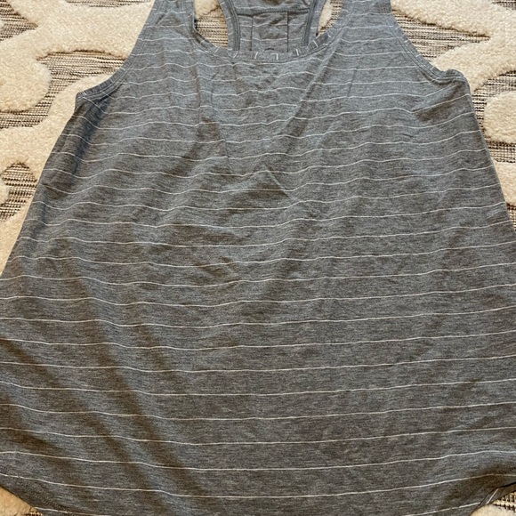 Bundle of 4. Lululemon EUC and GUC Size 10 Tanks. Check out all my Lulu! - Picture 4 of 8